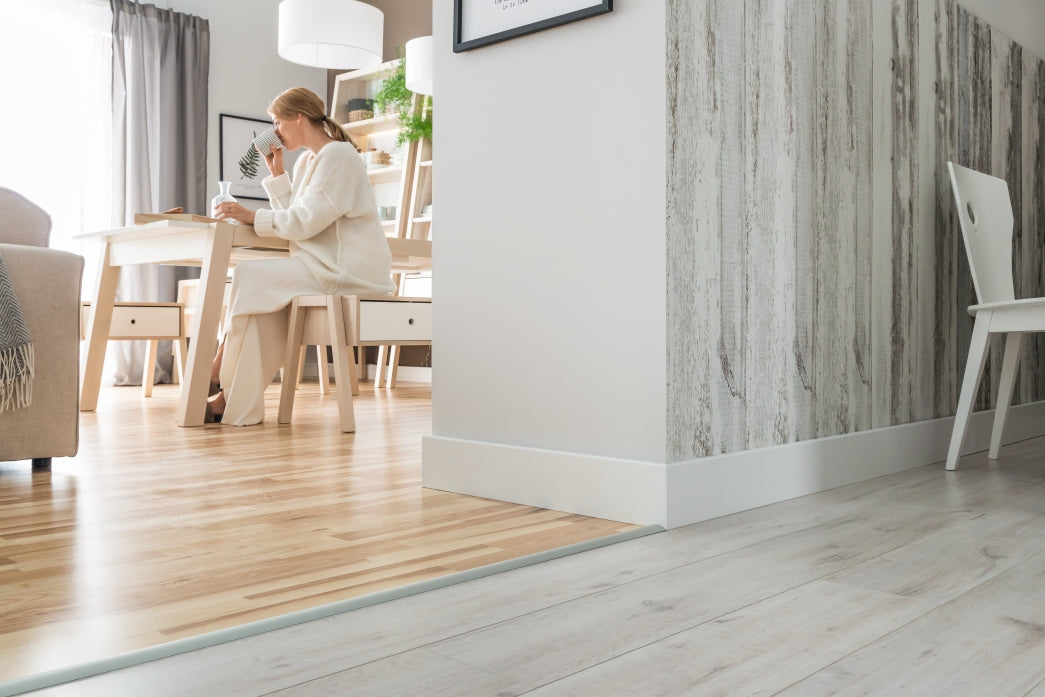 A lifestyle image of the Vox Evera skirting board EV401 in colour white.