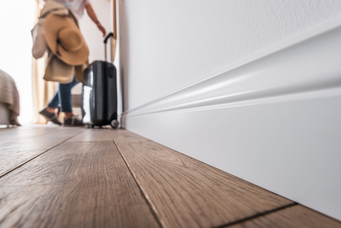 A lifestyle image of the Vox Evera skirting board  EV1011 in colour white.